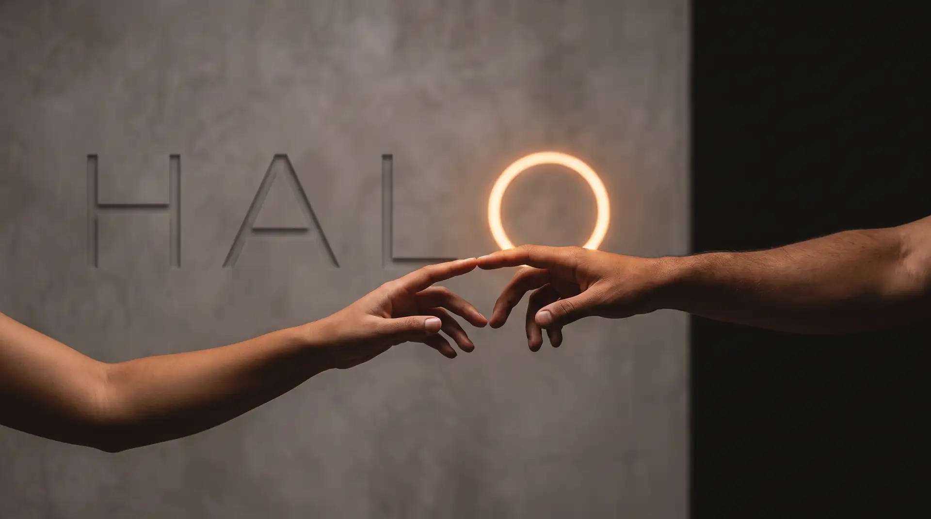 Two hands reaching for each other under Halo, the O a ring of light